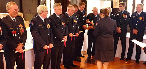 Officers receiving their certificates