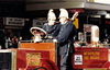 Lieutentant Ric Carlyon drives the Merryweather engine during a Fire Service parade down Queen Street