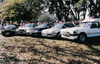 Fire Police members pose with their private cars for a photo to celebrate the 60th Anniversary